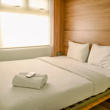 Comfort And Simple 2Br At Green Pramuka City Apartment By Travelio
